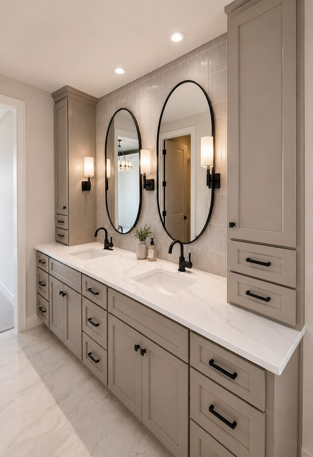 Double vanity with oval mirrors and vertical tile accent wall