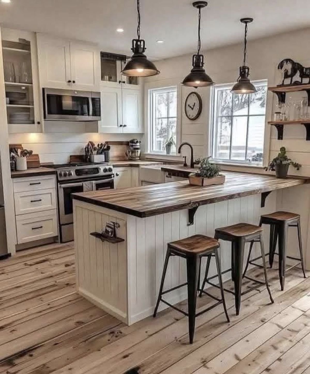 White shaker cabinets with butcher block island